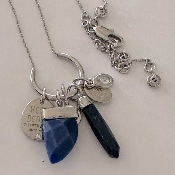 henri bendel Jewelry - Henri Bendel silver tone necklace with dark blue crystal and logo charms disc